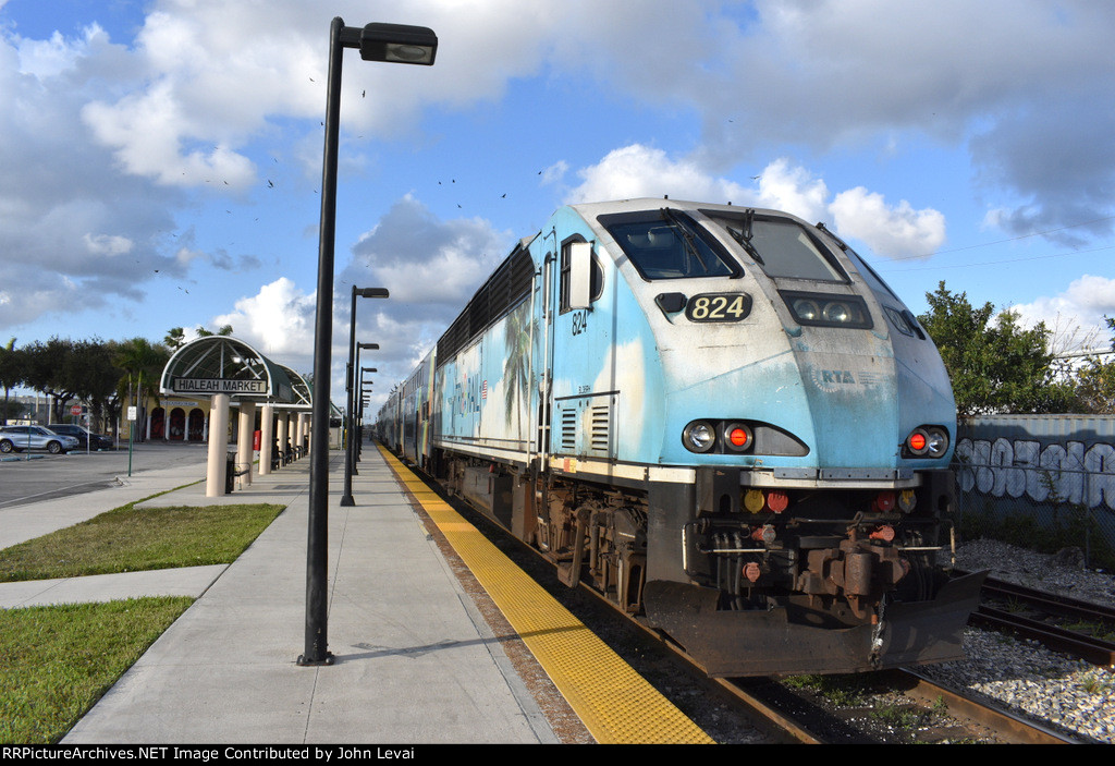 Northbound Tri-Rail train about to head away from Hialeah Market Sta 